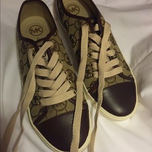Never worn MK sneakers which are very fitting