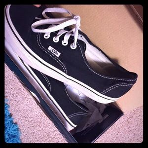 Black & white low top vans