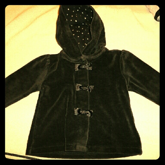 Black jacket with black bows