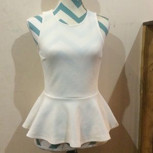 cream colored peplum top