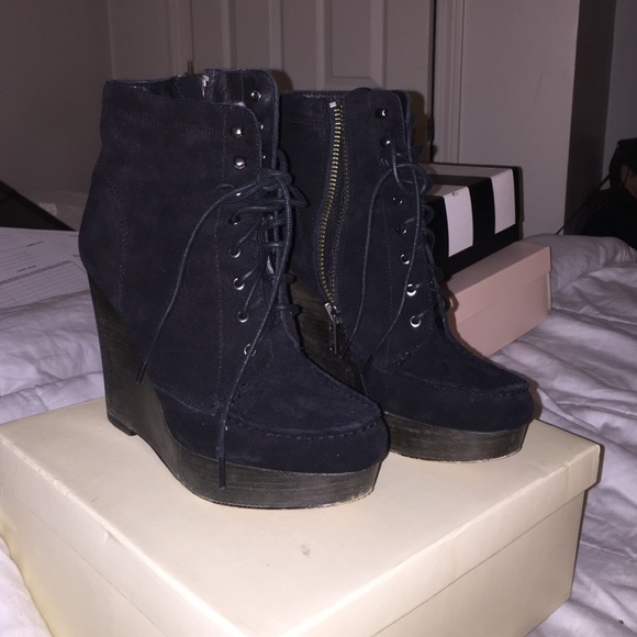 Wedged ankle boots coach