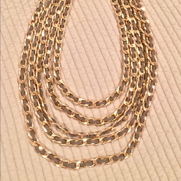 Gold and leather braided statement necklace