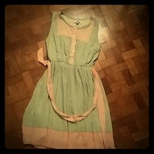 Vinatage-style pink and green pleated dress
