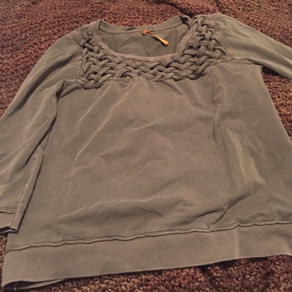 Olive green sweatshirt top with woven detail