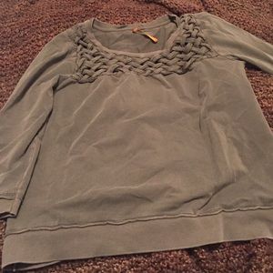 Olive green sweatshirt top with woven detail