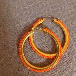 Orange beaded hoops