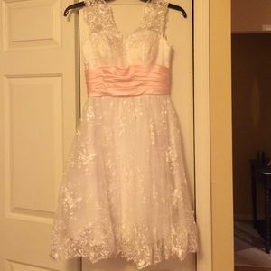 White and pastel pink wedding dress