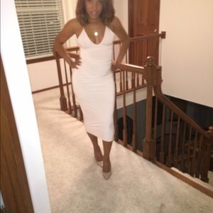 Sexy body con soft pink dress.