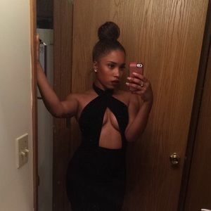 Super sexy little black dress, with front opening