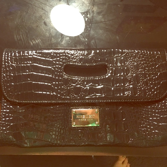 West nine clutch, never used