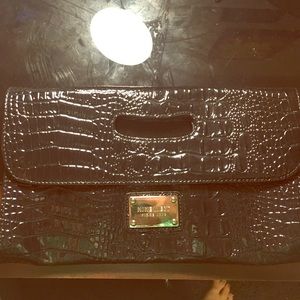 West nine clutch, never used