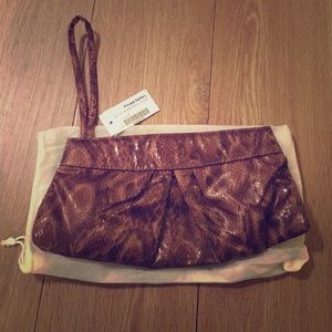 Snakeskin print clutch