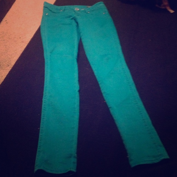Teal Volcom skinny jeans