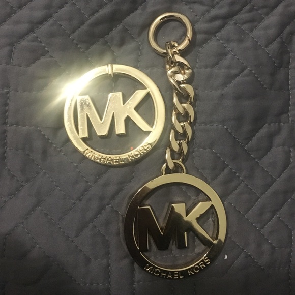 2 Michael Kors  purse logos .