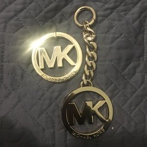 2 Michael Kors  purse logos .