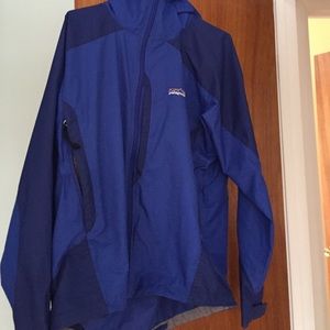blue Patagonia rain jacket