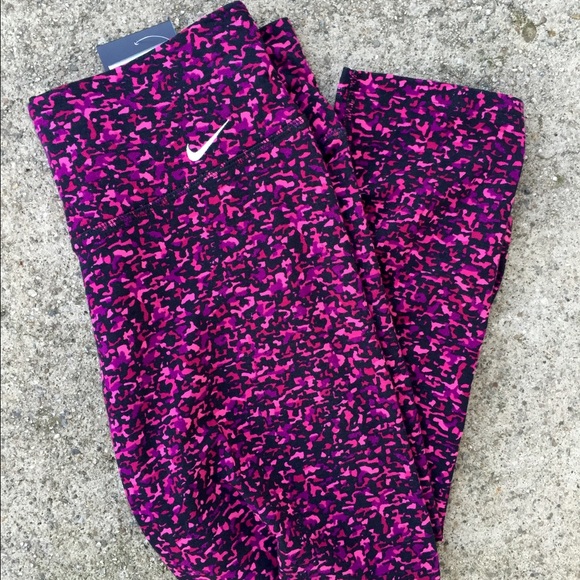 Nike Pants - Nike dri fit pink and black workout Capri tights
