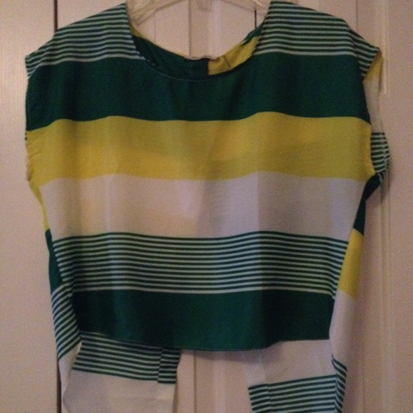 Multi color top with a slit up the back