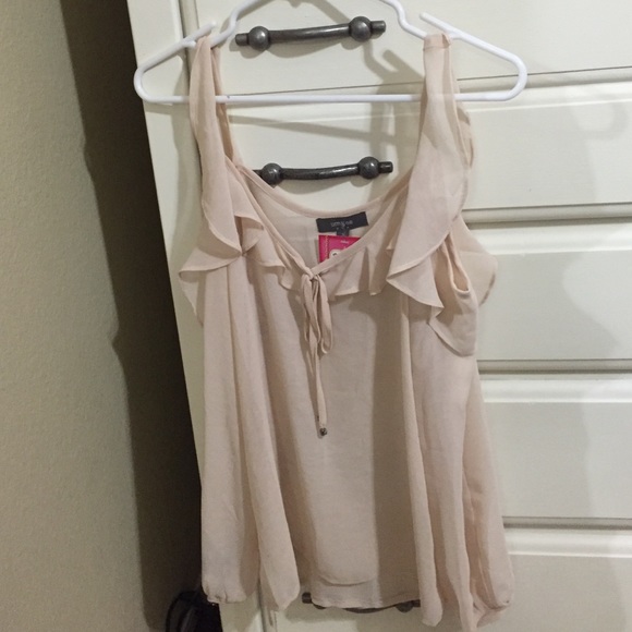 Nude/tan colored blouse