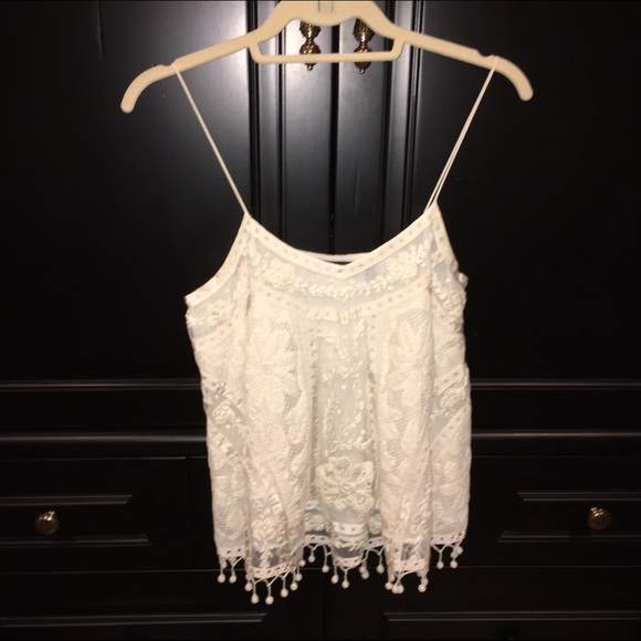 Cute tank with floral detailed design