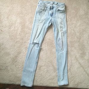 H&M ripped skinny jeans pale blue.