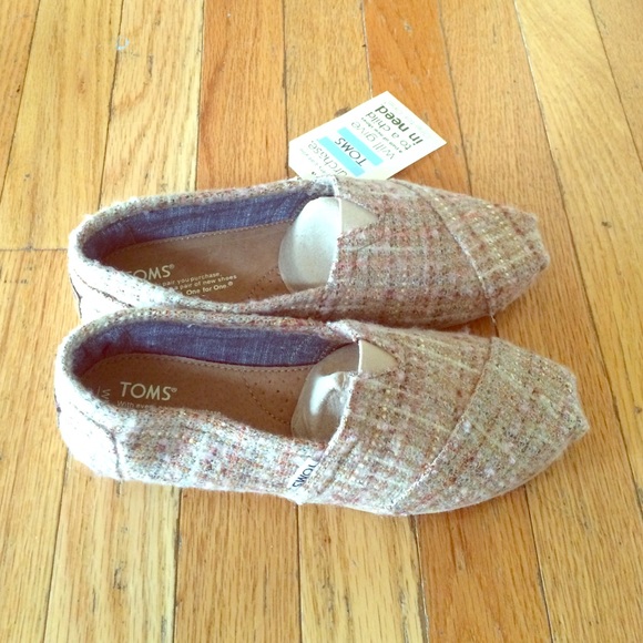 Size 7.5 Women's Toms. Negotiable!!