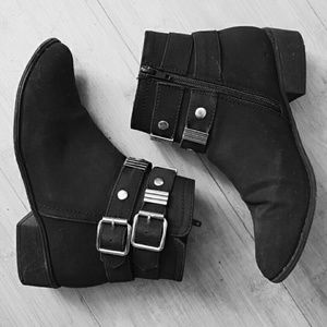 Black ankle books with gold buckles