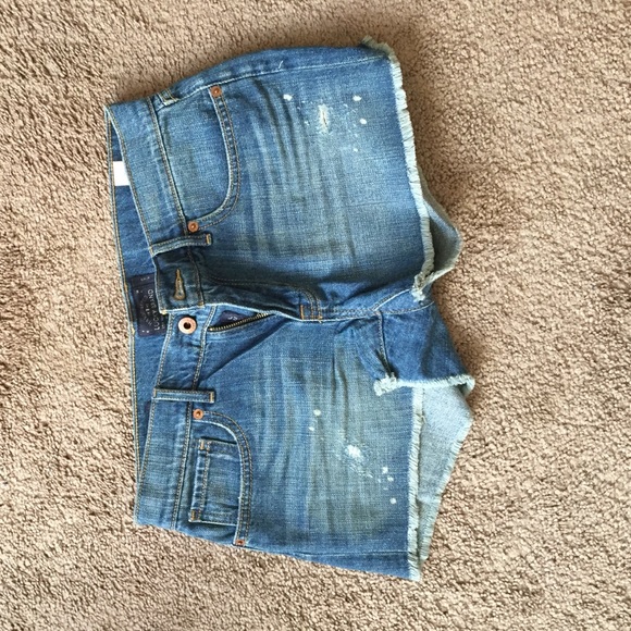 Distressed denim cut offs