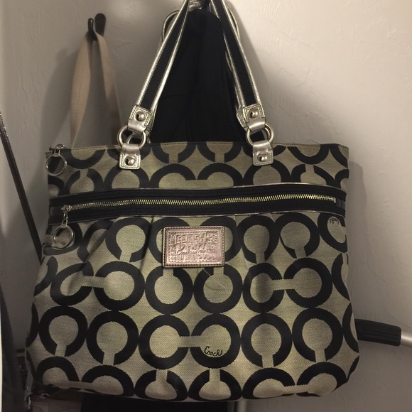 Gray and black Coach purse