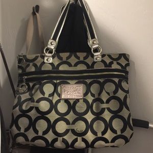 Gray and black Coach purse