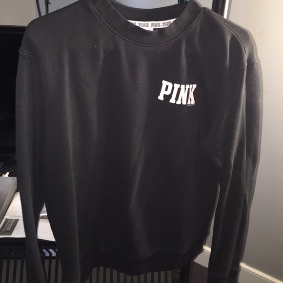 Pink sweatshirt.