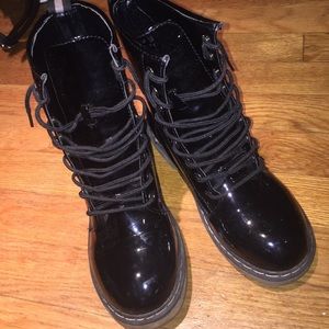 Boots from a store called mandees , size 5.5y