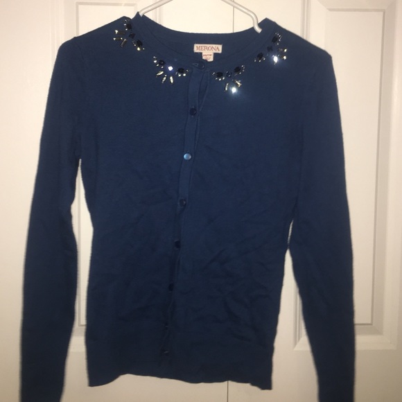 A super adorable blue, button up sweater