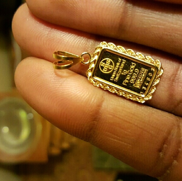 United Bank of Switzerland 1g dainty  pendant
