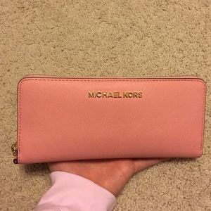Pale pink jet set travel MK wallet