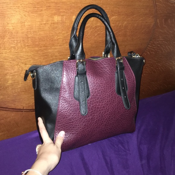 Super cute burgundy and black purse.