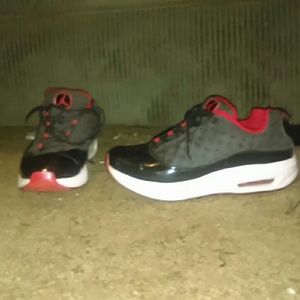 Black, Red and white Jordan tennis shoes