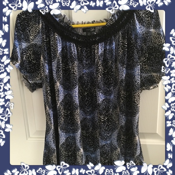 Blue, black, white top.