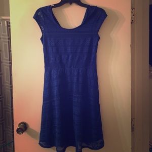Blue lace dress with open back detail