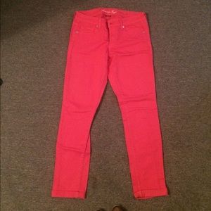 Reddish pink AE jeans