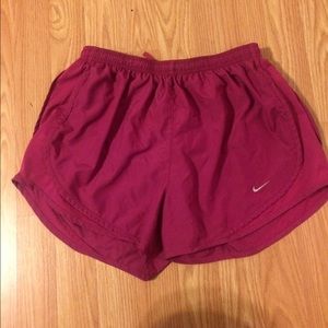 Pink nike shorts.