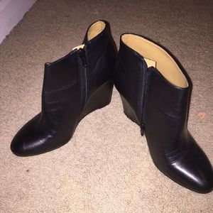 Black wedge booties