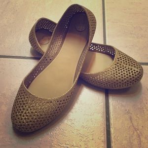 Adorable gold jelly flats