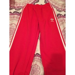 Red adidas athletic pants