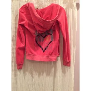 A pink juicy couture jacket.