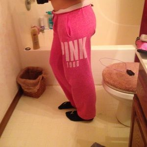 PINK sweatpants . Worn but still good condition