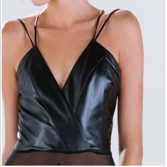 Faux leather bodysuit and asymmetrical skirt.