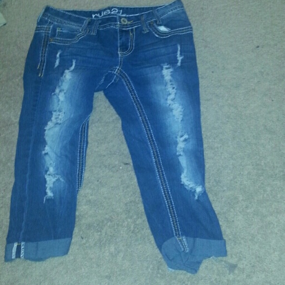 Ripped knee high skinny jeans