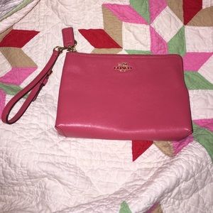 Pink leather coach wristlet. Large