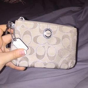 Coach wristlet light tan and silver